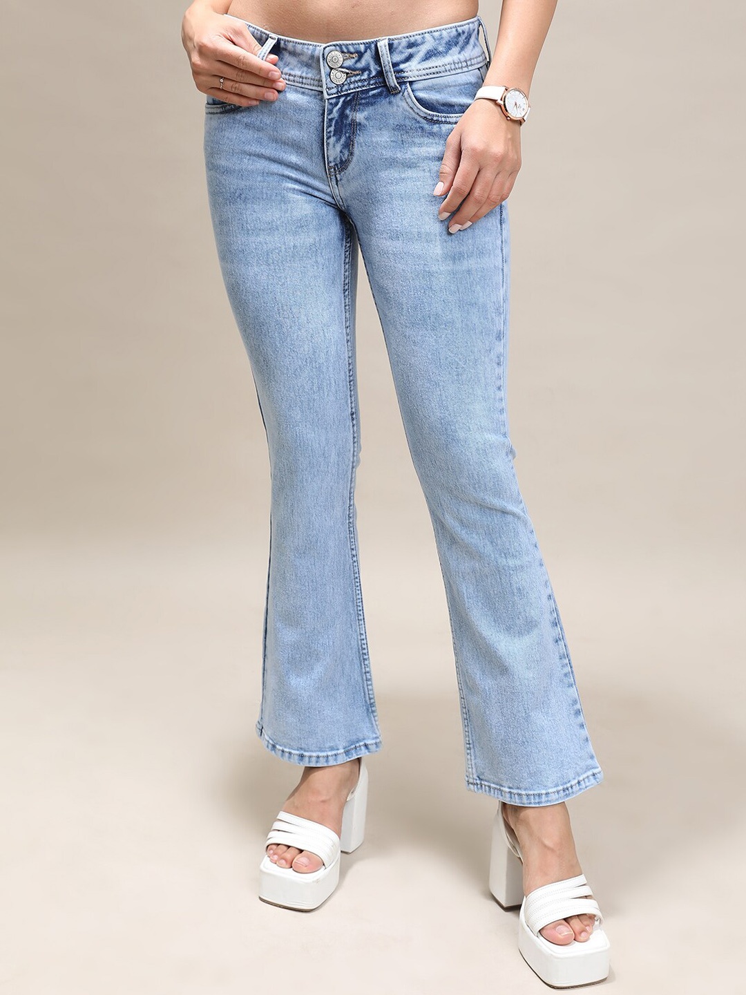 

Tokyo Talkies Women Mid-Rise Clean Look Bootcut Heavy Fade Stretchable Jeans, Blue