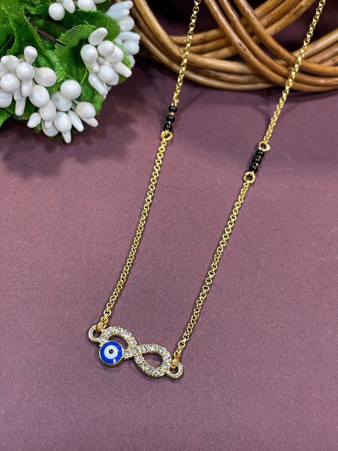 

Digital Dress Room Gold Plated And Beads Evil Eye Pendant Mangalsutra