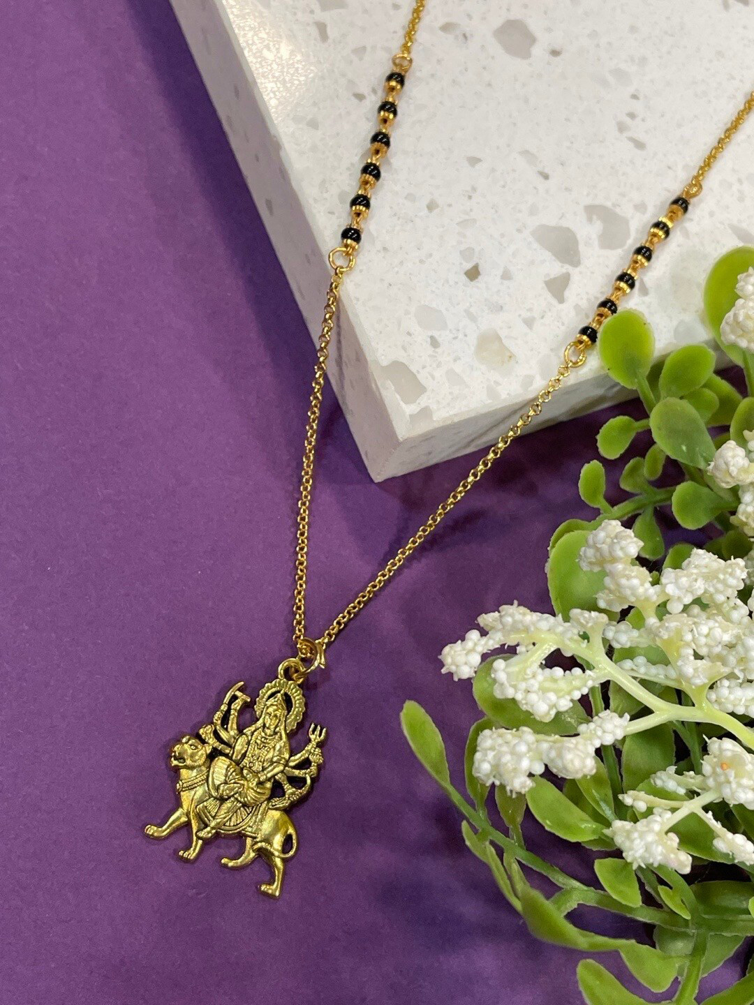 

Digital Dress Room Gold Plated And Beaded Laxmi Pendant Mangalsutra