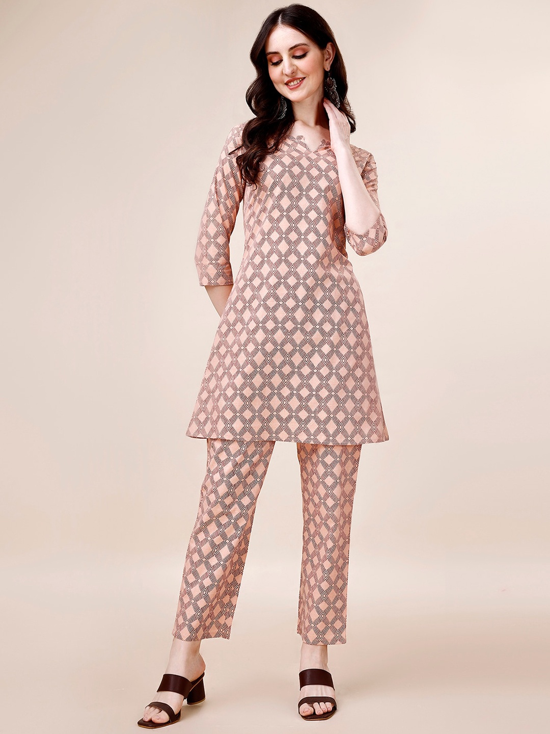

Amrutam Fab Ethnic Motifs Printed Pure Cotton A Line Kurti With Palazzos, Peach