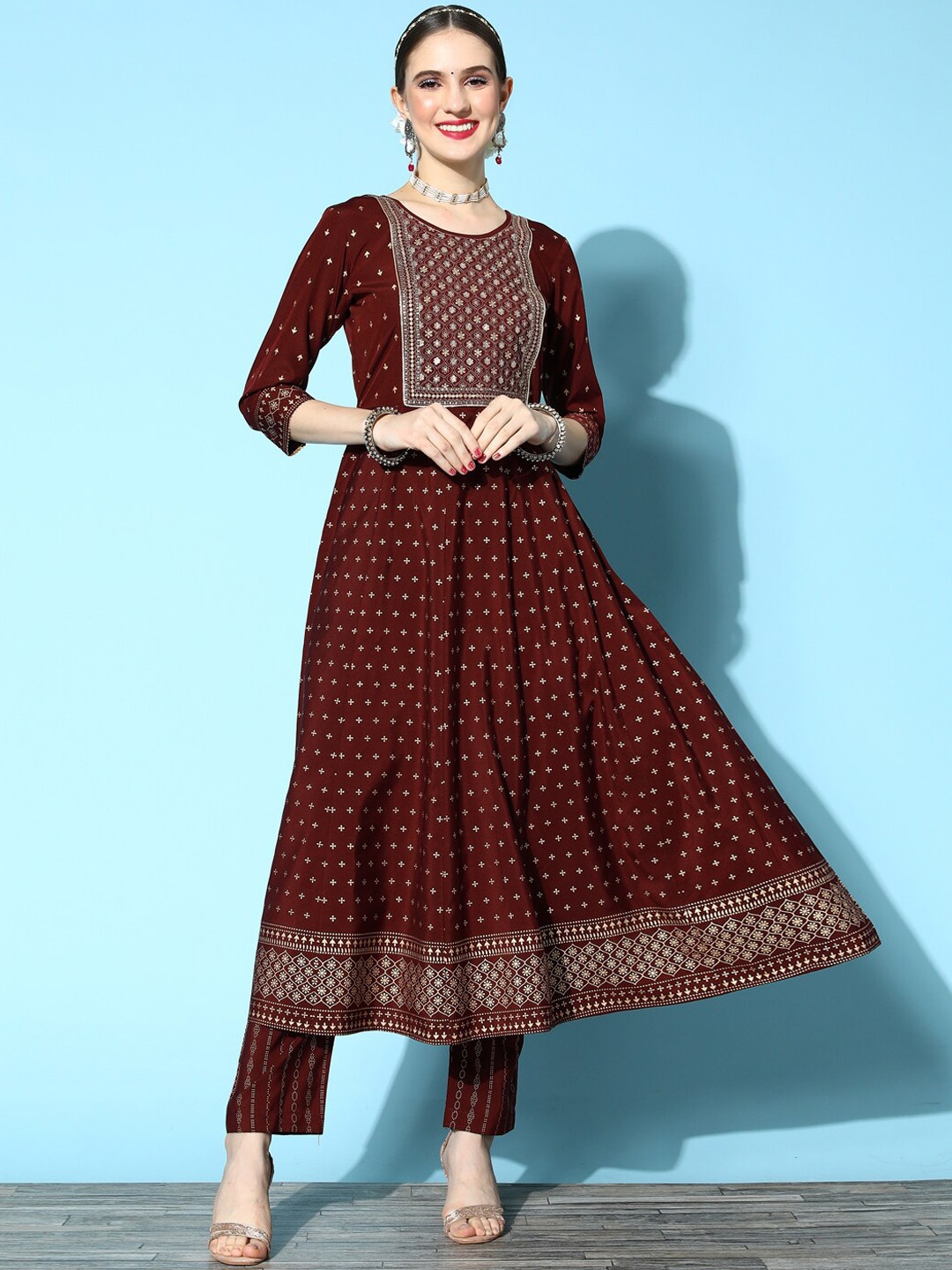 

Sangria Maroon Ethnic Motifs Printed Thread Work Detail Anarkali Kurta With Trouser Set