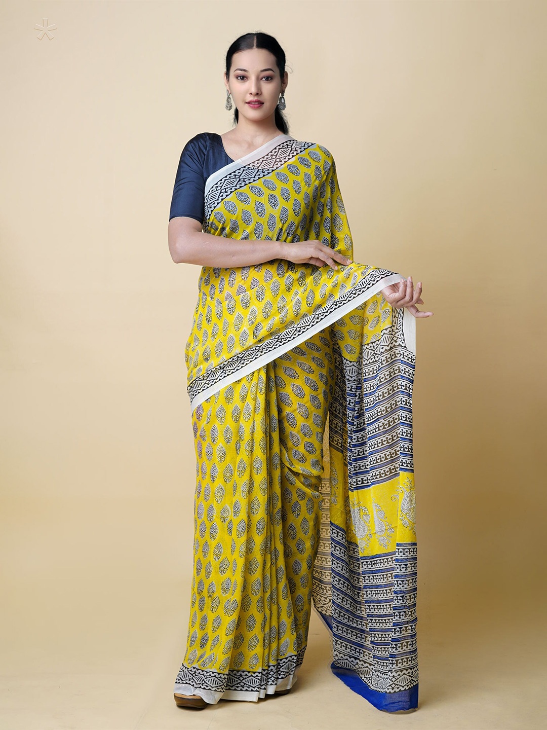 

Unnati Silks Ethnic Motifs Pure Silk Bagru Saree, Yellow