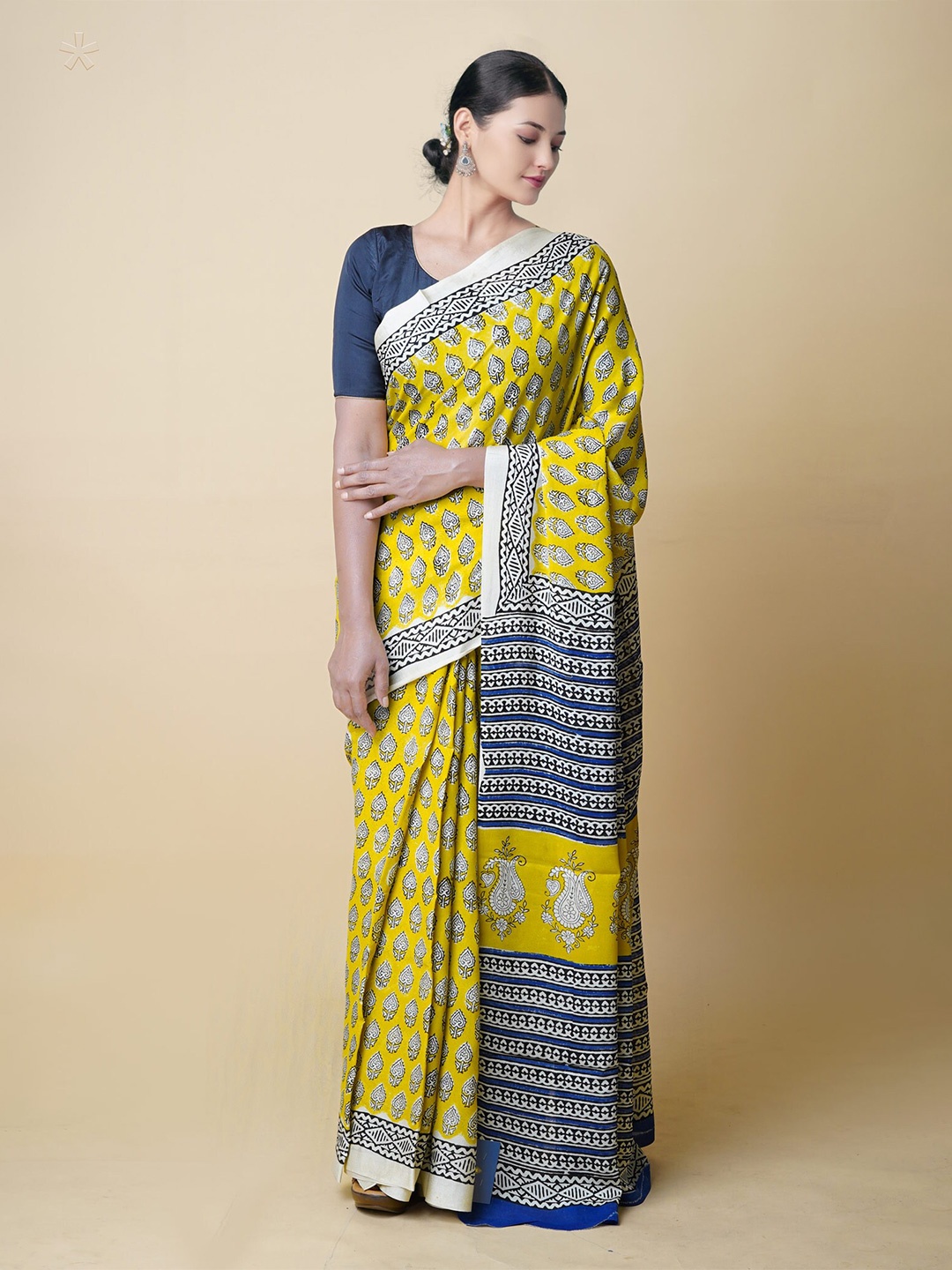 

Unnati Silks Ethnic Motifs Printed Pure Georgette Bagru Saree, Yellow