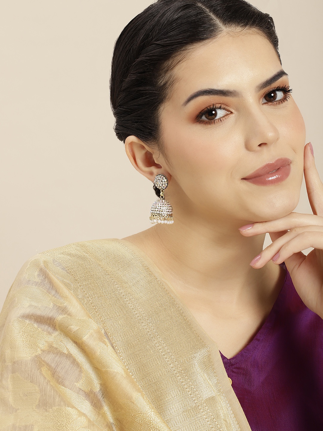 

Anouk Gold-Toned & White Dome Shaped Jhumkas Earrings