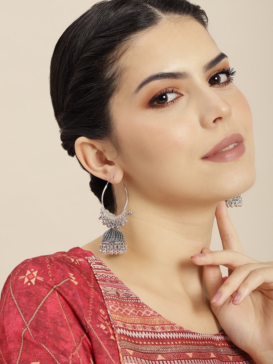 

Anouk Silver-Plated Dome Shaped Jhumkas