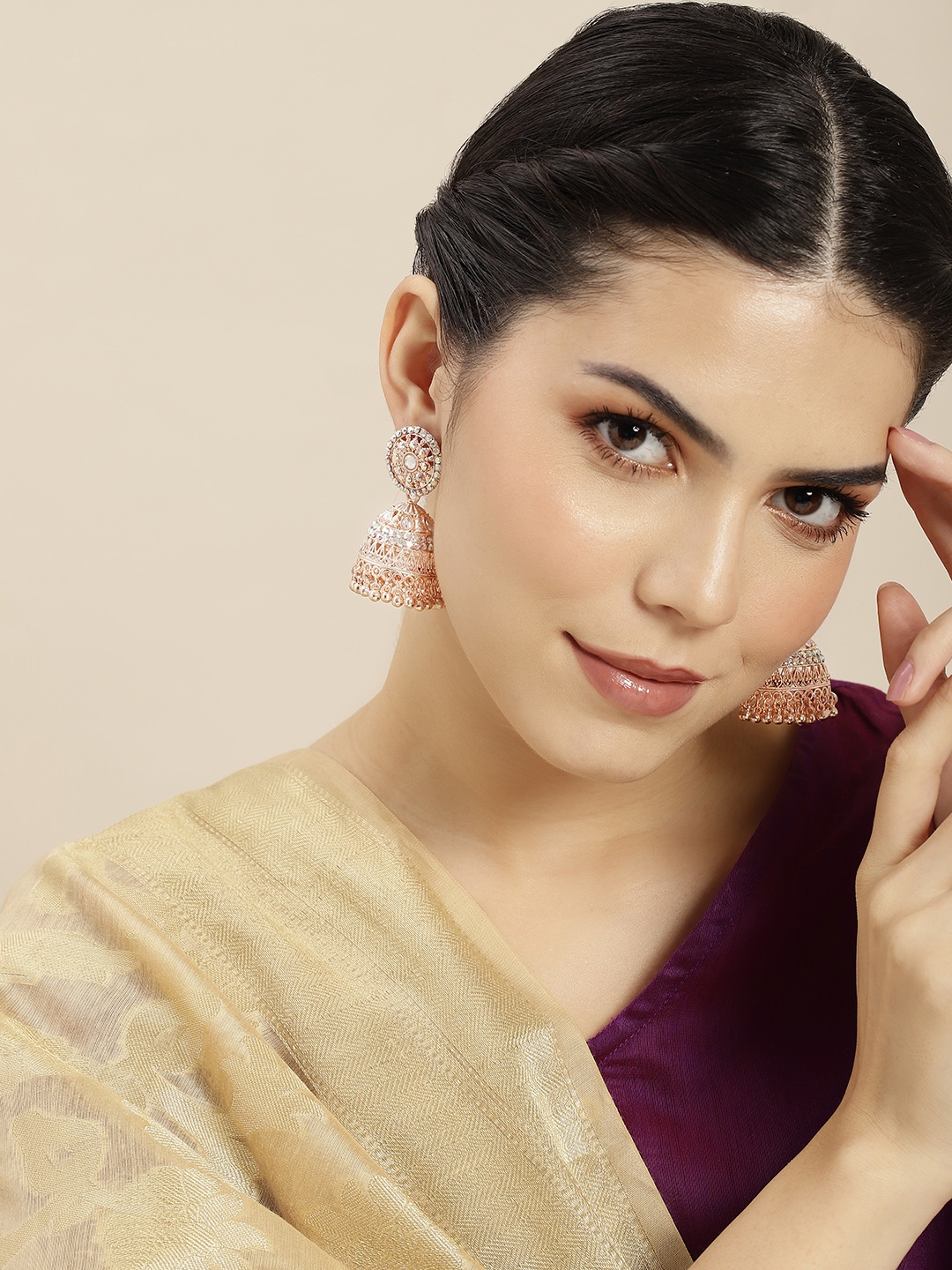 

Anouk Rose Gold Dome Shaped Jhumkas Earrings