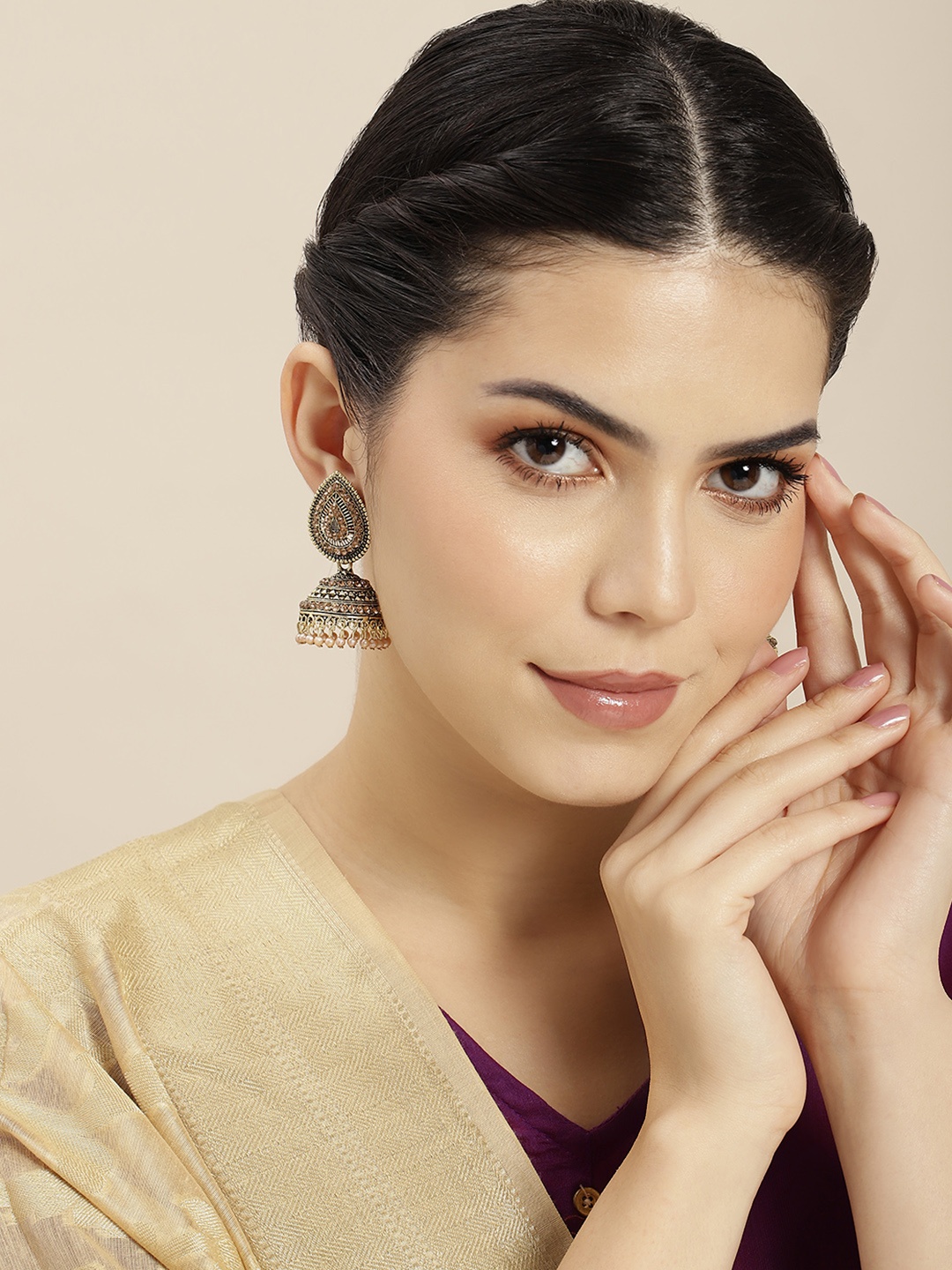 

Anouk Gold-Toned Dome Shaped Jhumkas Earrings