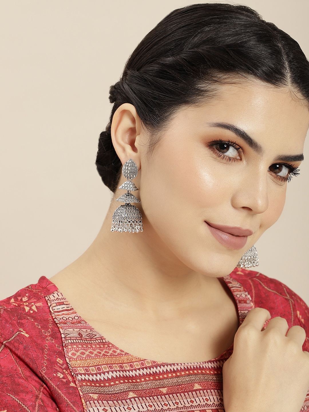 

Anouk Silver-Plated Dome Shaped Jhumkas