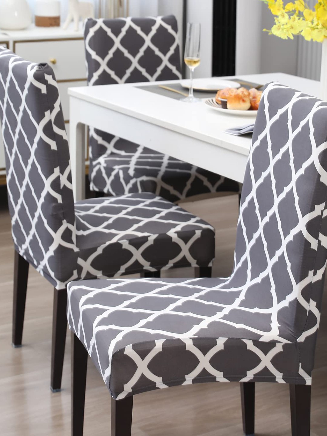 

Dakshya Industries Grey & White 4 Pieces Printed Stretchable Chair Covers