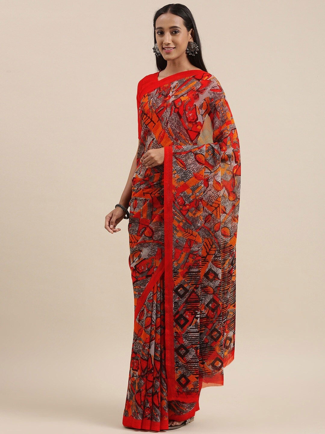 

Shaily Abstract Printed Pure Georgette Saree, Red