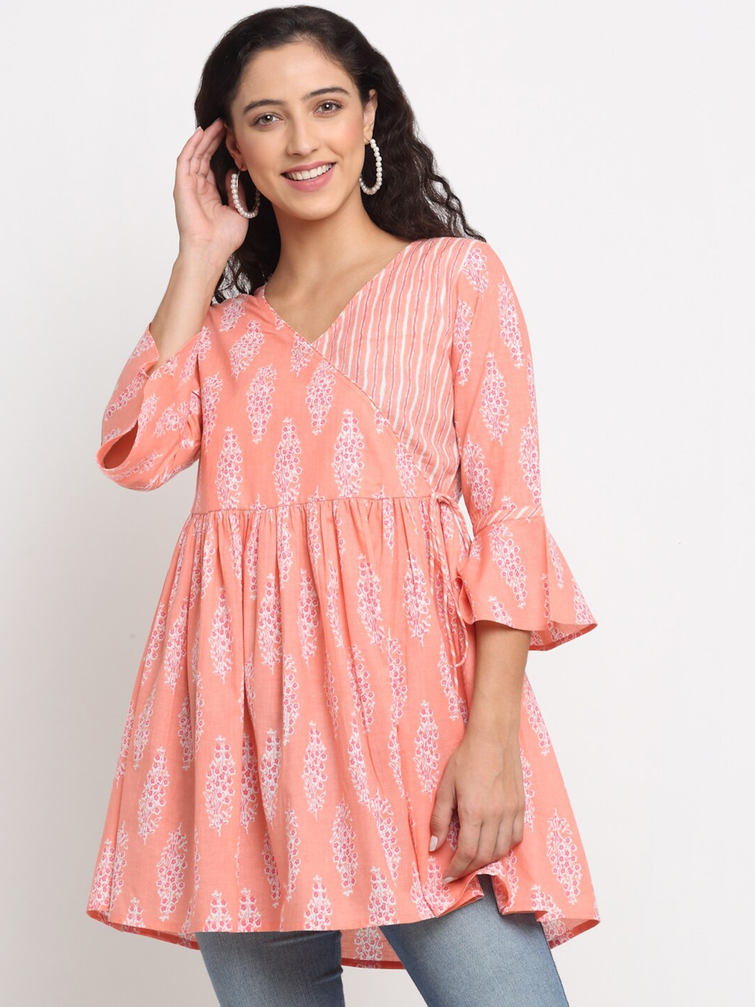 

KALINI Floral Printed Bell Sleeves Cotton Empire Top, Peach