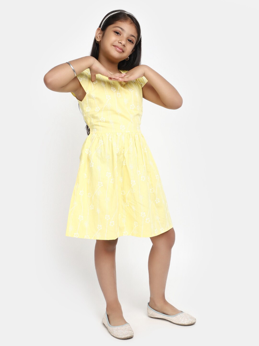 

V-Mart Ethnic Motifs Printed Tie-Ups Cotton Fit & Flare Dress, Yellow