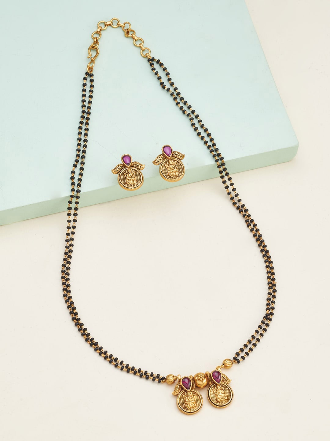 

Kushal's Fashion Jewellery Gold-Plated Antique Stones Mangalsutra