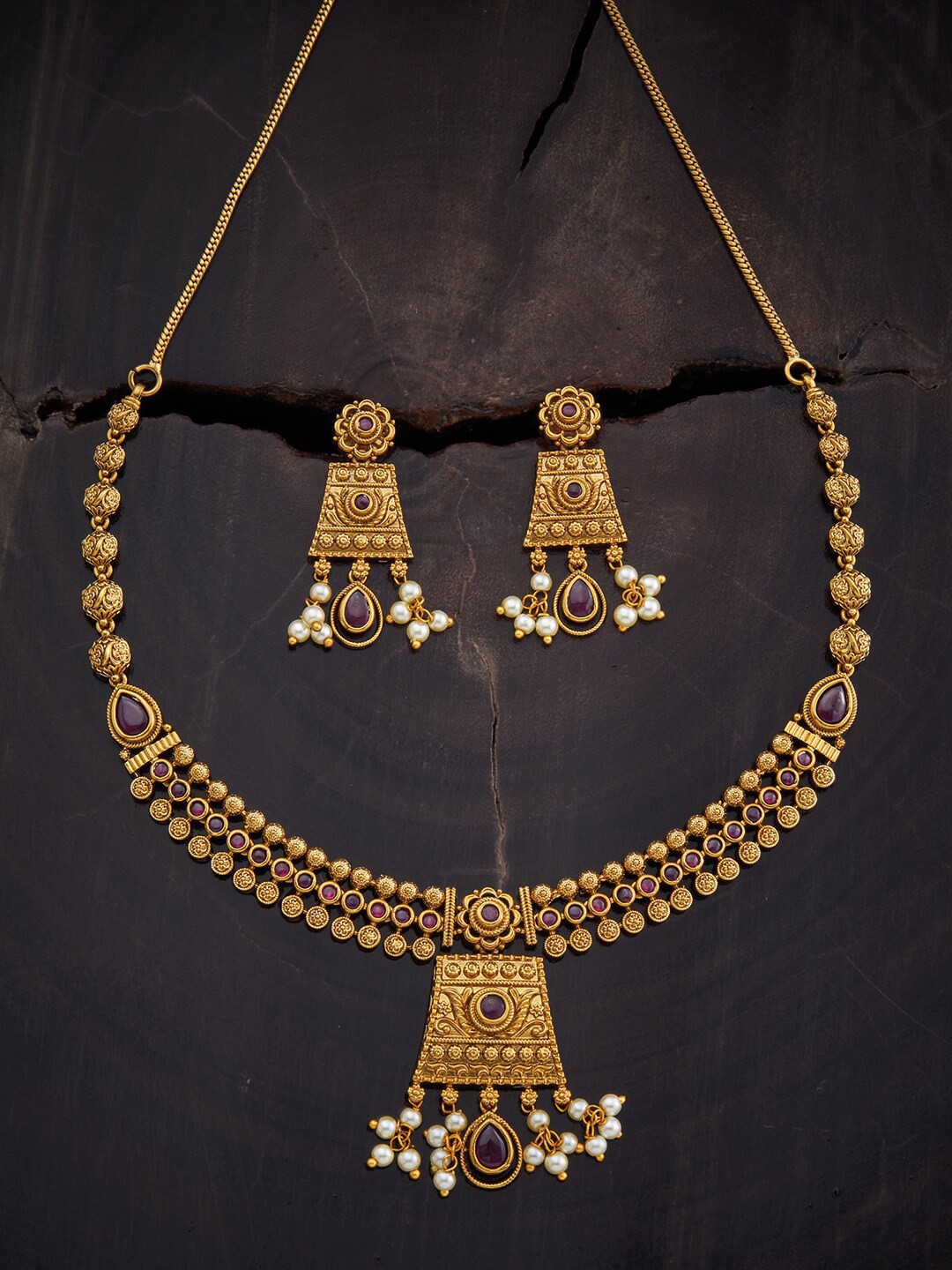 

Kushal's Fashion Jewellery Gold-Plated Pearls-studded Antique Jewellery Set