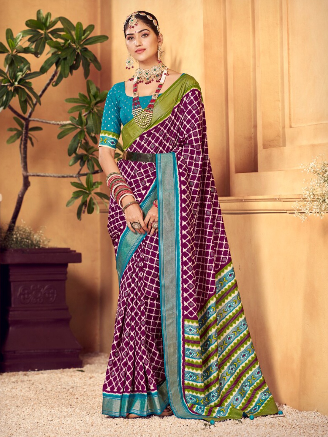 

Mitera Magenta & White Geometric Printed Silk Cotton Leheriya Saree