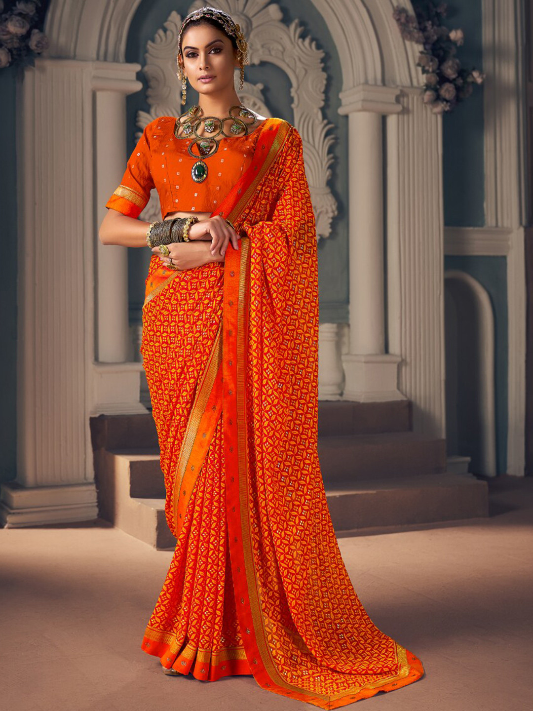 

Mitera Orange Ethnic Motifs Printed Beads and Stones Block Print Saree