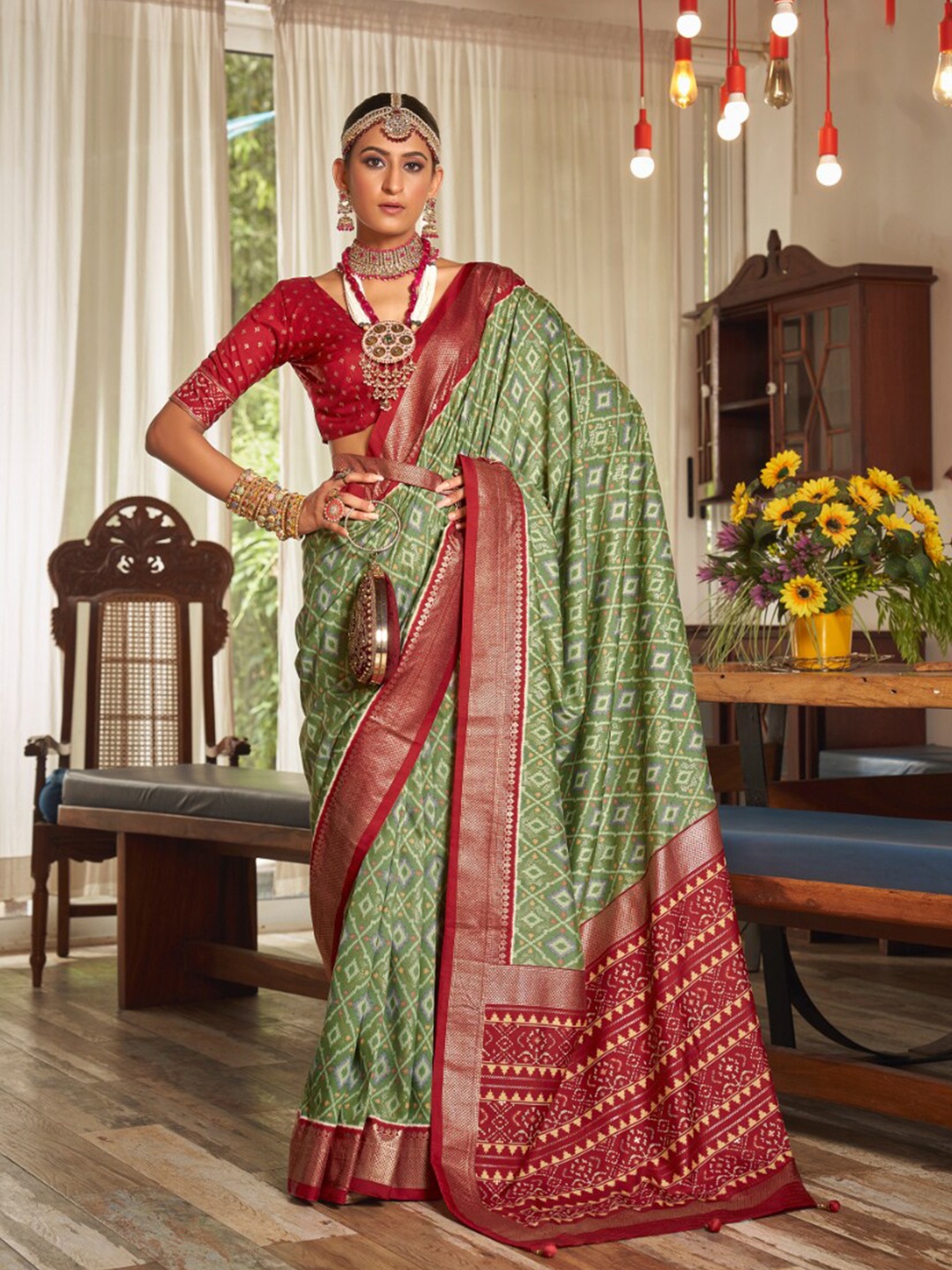 

Mitera Olive Green & Red Geometric Printed Zari Silk Cotton Ikat Saree