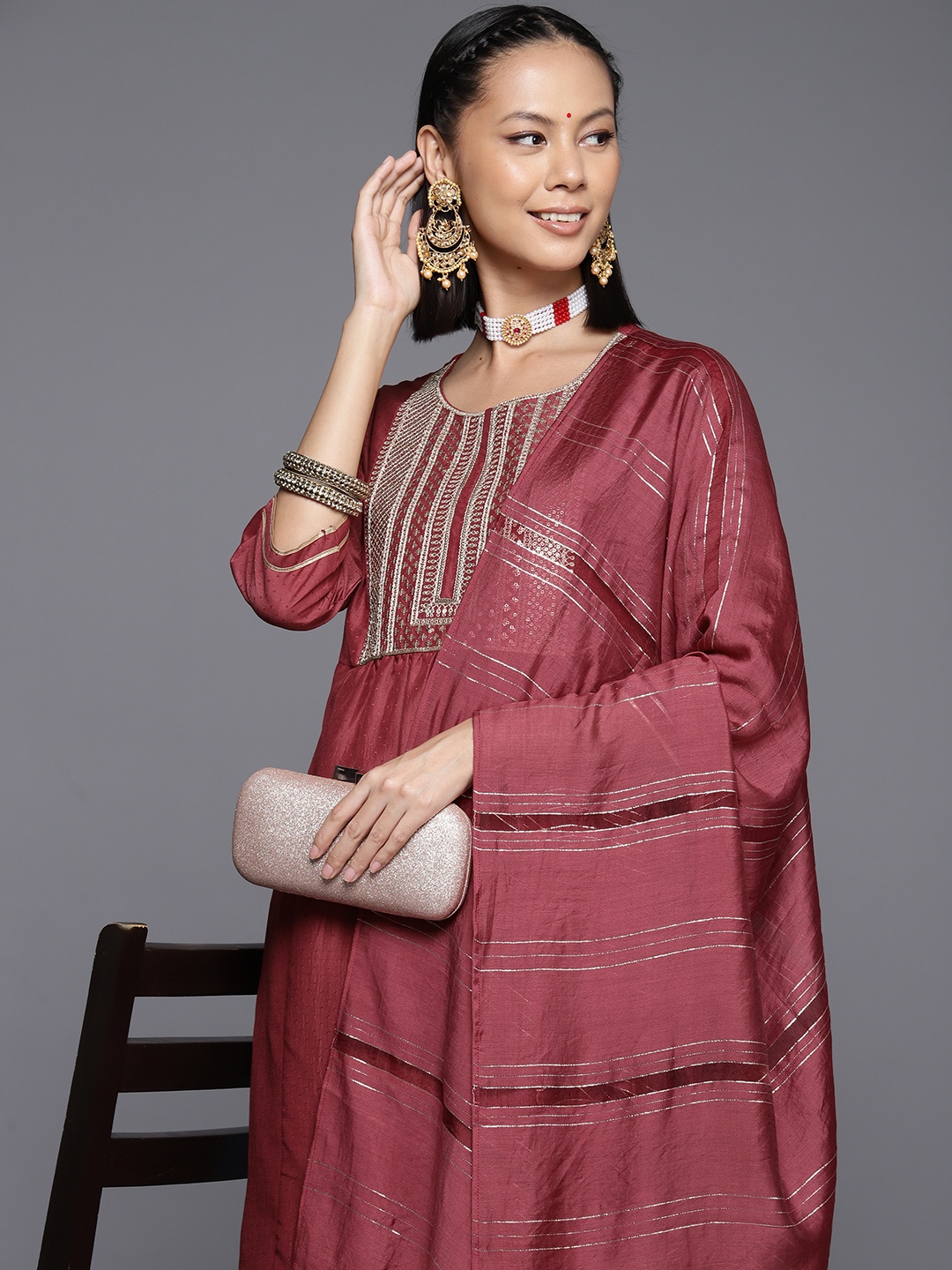 

Varanga Women Yoke Design Sequinned Kurta with Trousers & With Dupatta, Rust