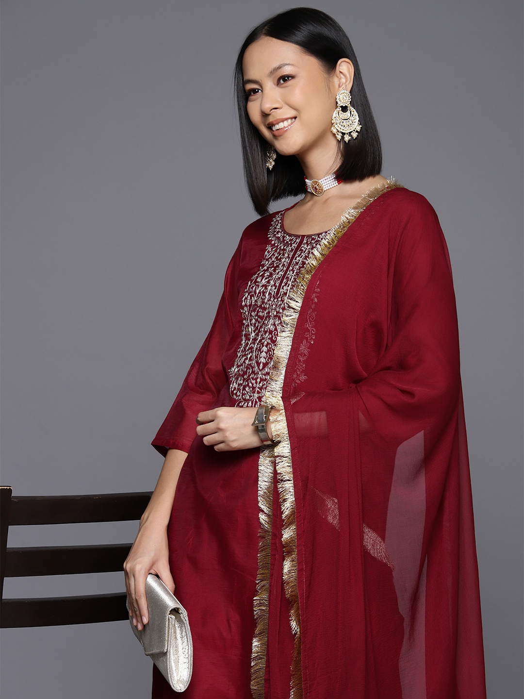 

Varanga Women Floral Yoke Design Sequinned Chanderi Silk Kurta with Trousers & Dupatta, Maroon