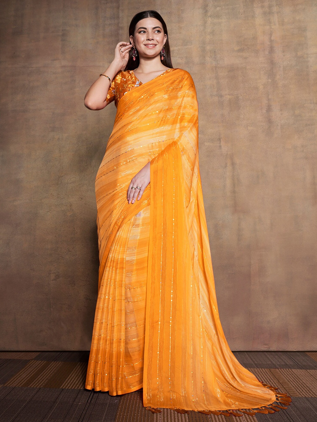 

Mitera Yellow & White Sequinned Embellished Pure Chiffon Saree