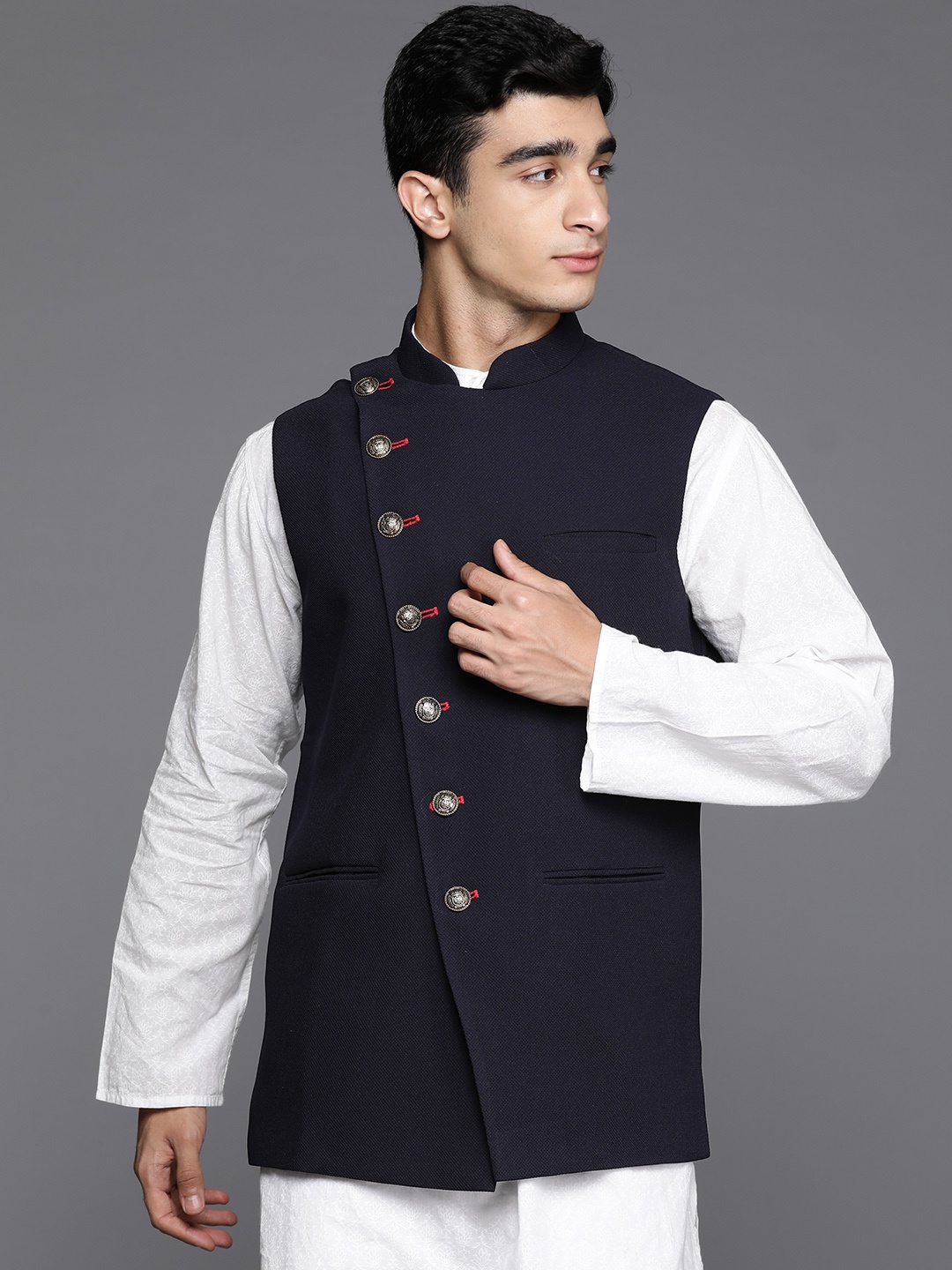 

Manu Solid Mandarin Collar Asymmetric Placket Nehru Jacket, Navy blue