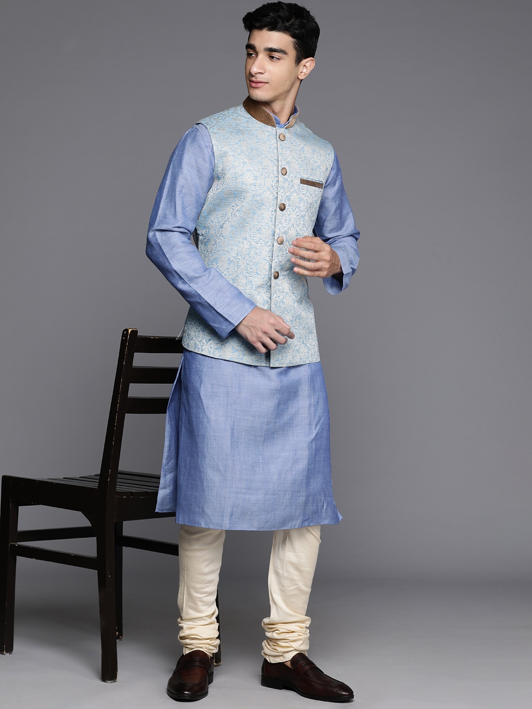 

Manu Men Solid Mandarin Collar Kurta With Churidar & Embroidered Nehru Jacket, Blue