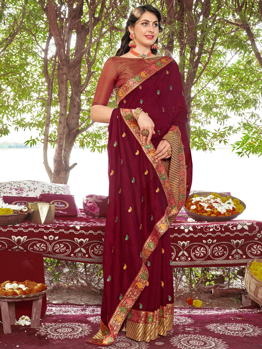 

Mitera Maroon Paisley Embroidered Zari Detailed Saree