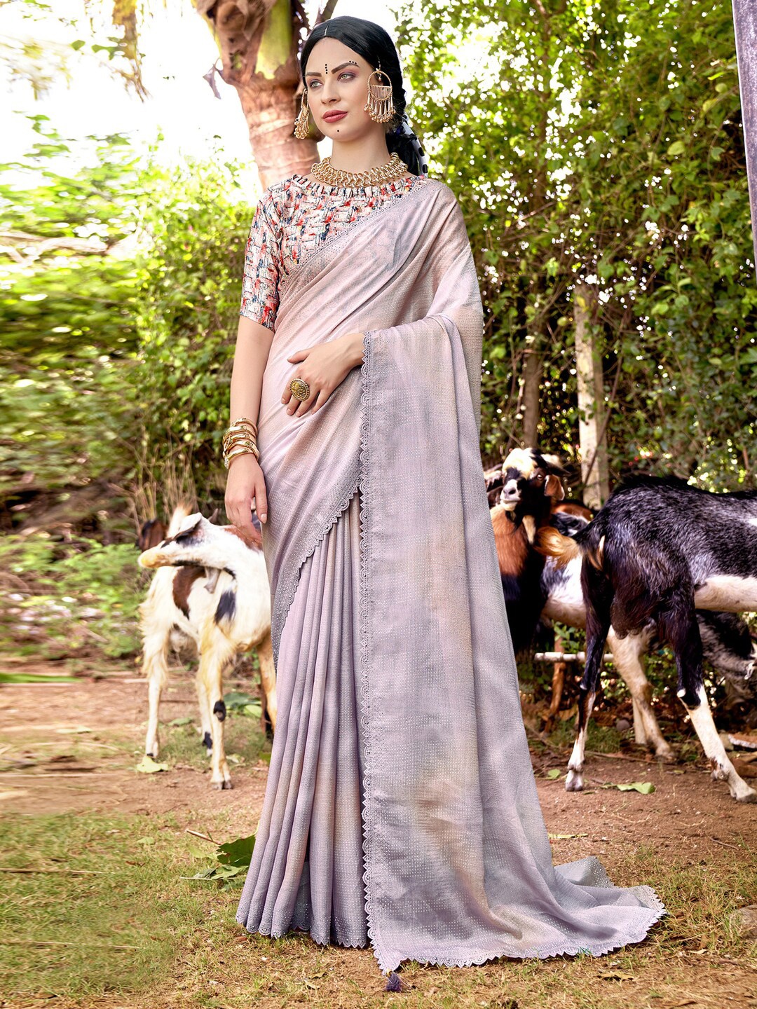 

Mitera Lavender Ethnic Motifs Embellished Beads And Stones Saree