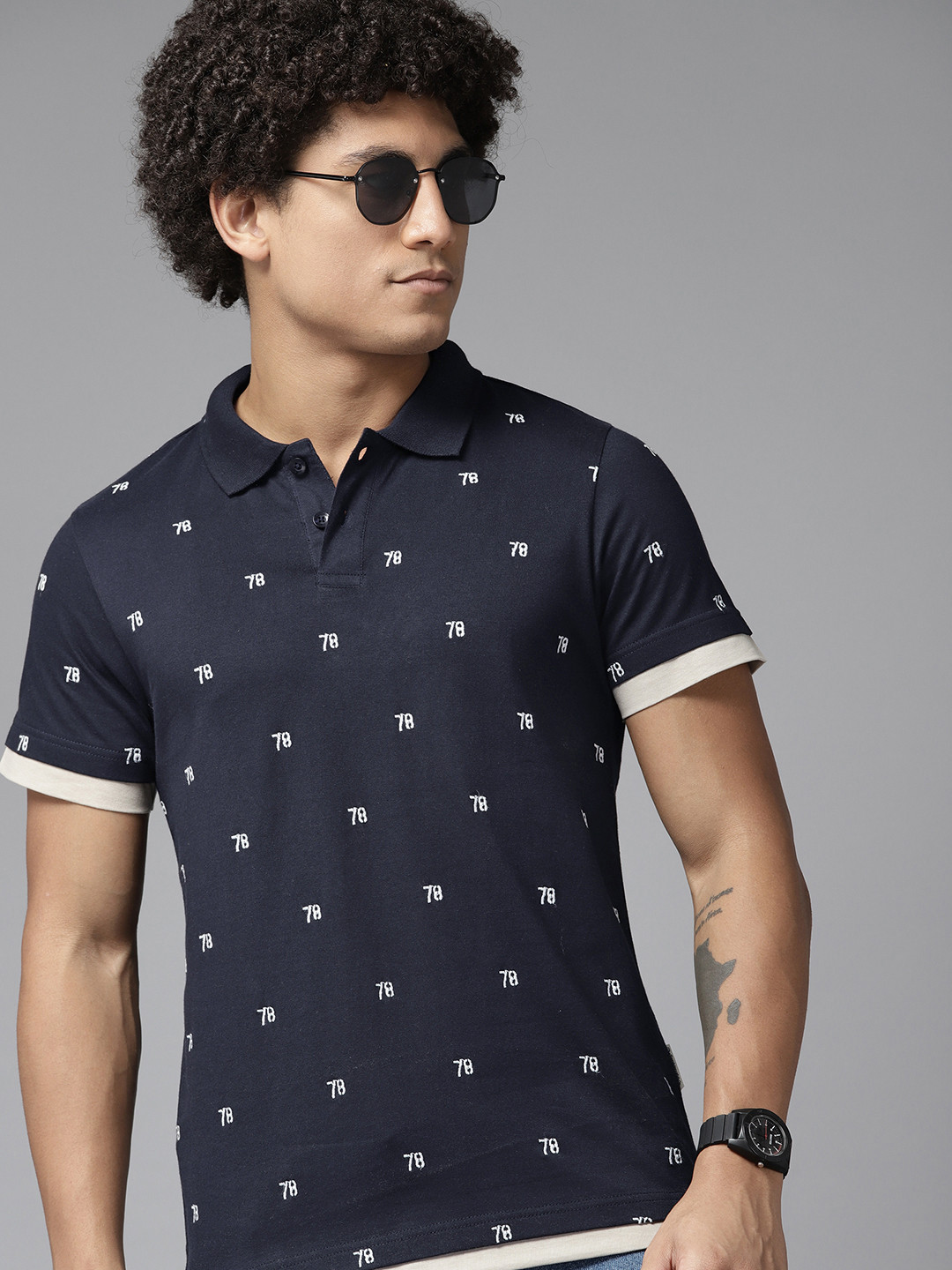 

Roadster Men Typography Printed Polo Collar Pure Cotton T-shirt, Navy blue