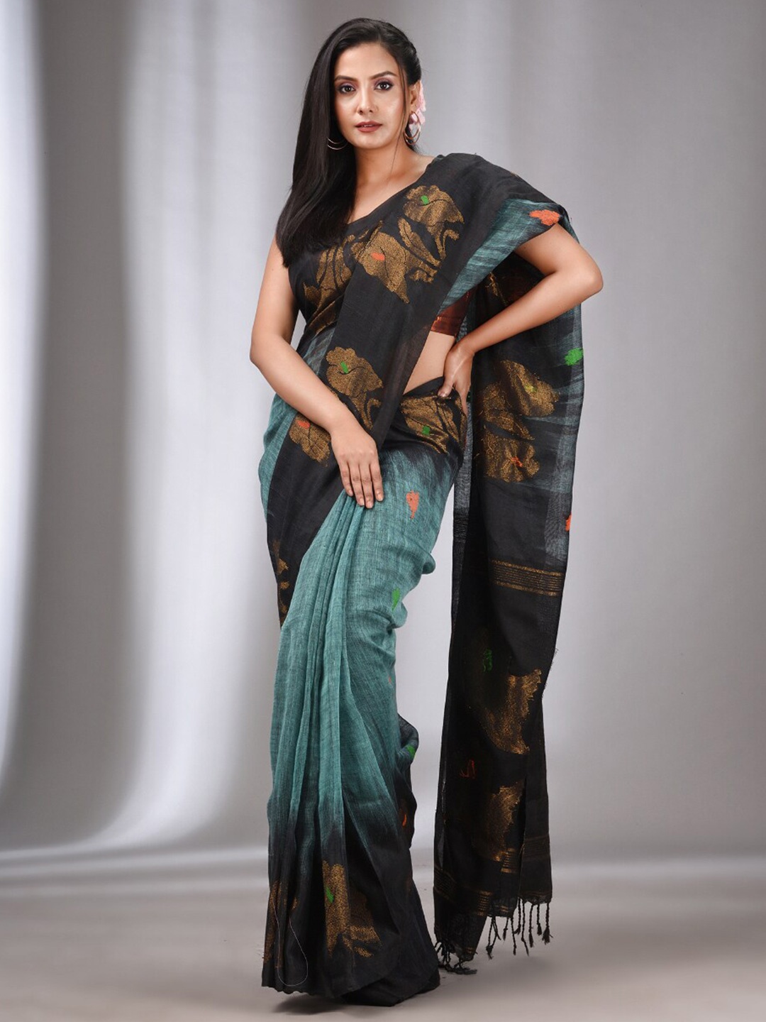 

Charukriti Floral Woven Design Zari Pure Linen Saree, Teal