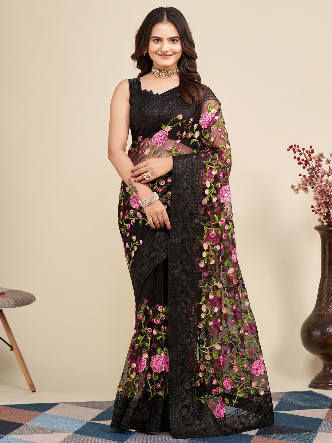 

VAIRAGEE Black & Pink Floral Embroidered Net Saree
