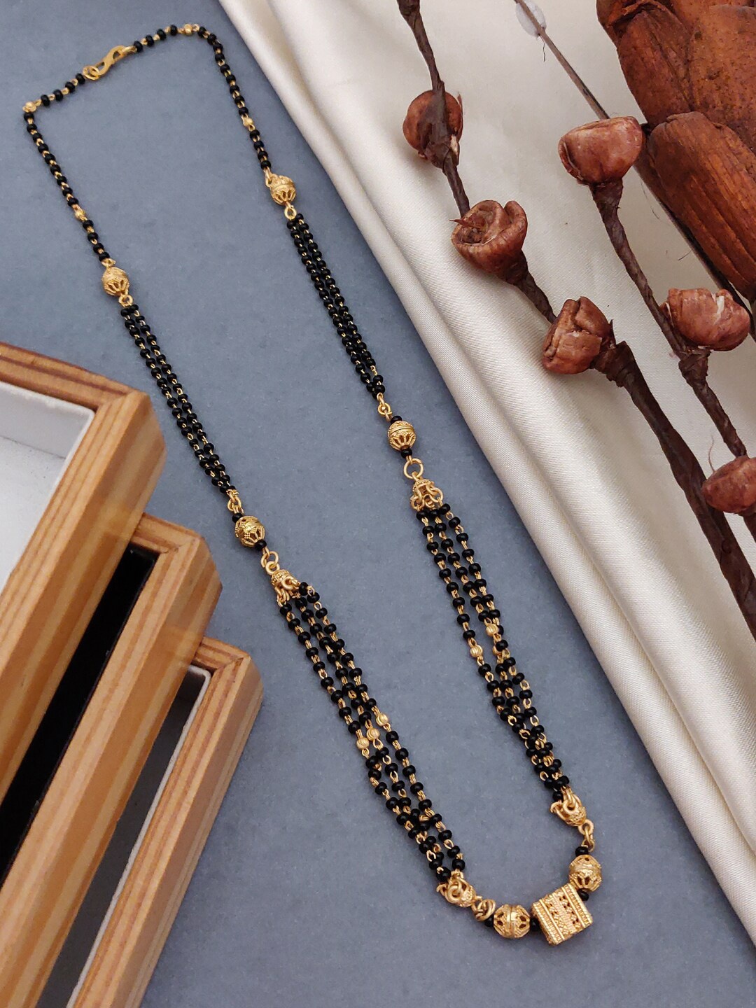 

Shining Diva Fashion Gold-Plated Artificial Beads Mangalsutra