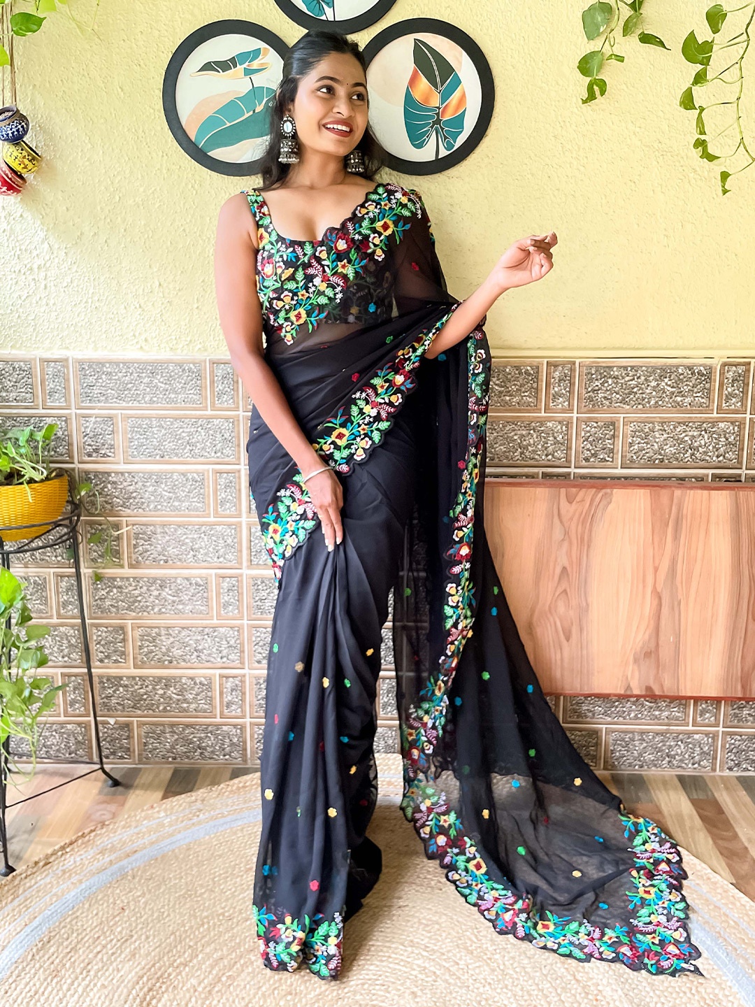 

Mitera Black & Red Floral Embroidered Saree