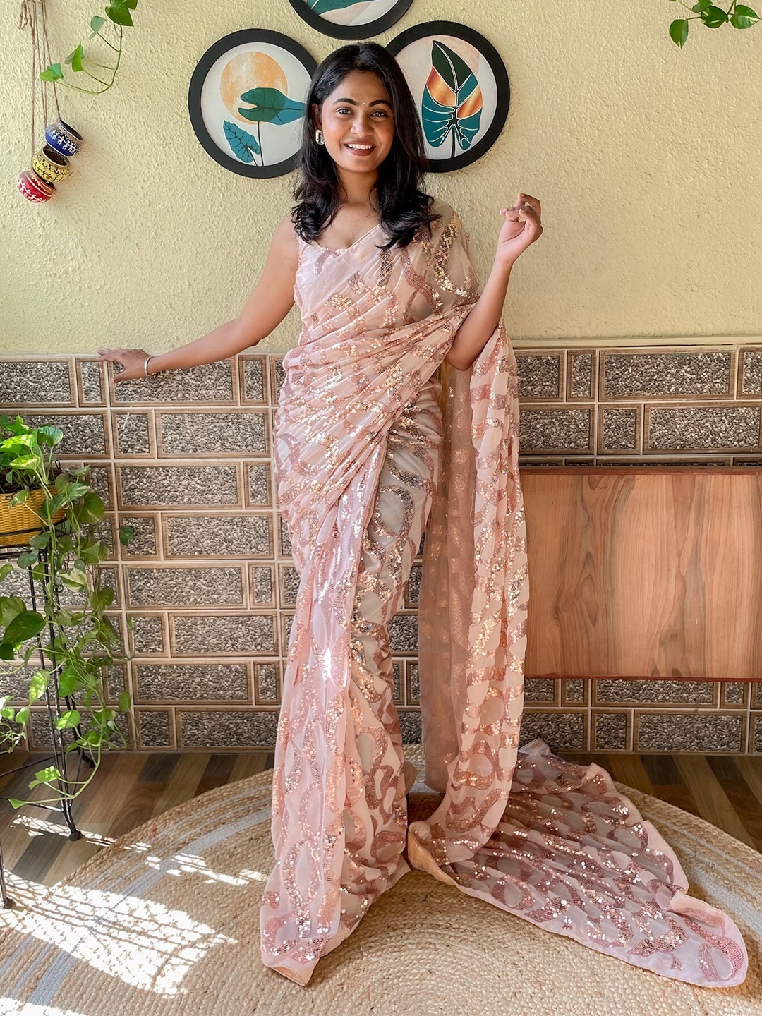 

Mitera Peach-Coloured Embellished Sequinned Saree