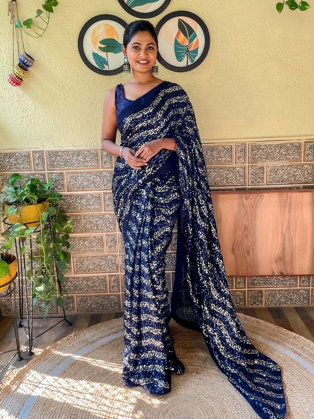 

Mitera Navy Blue & Gold-Toned Sequinned Embellished Saree