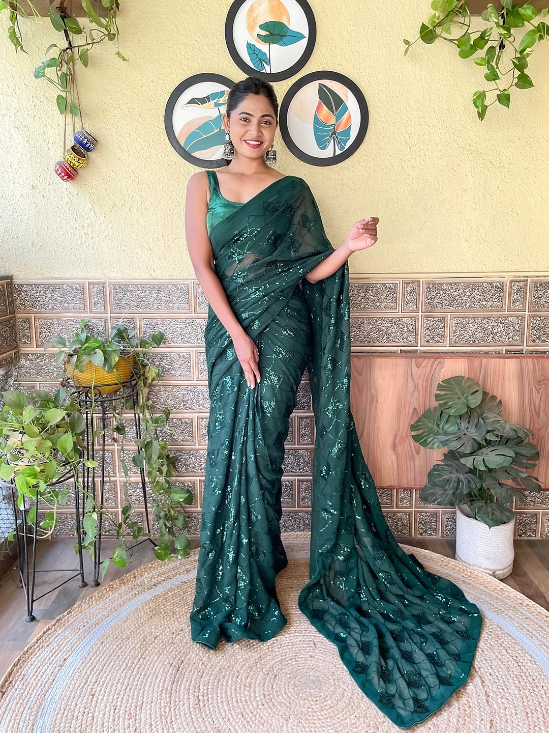 

Mitera Green Embellished Sequinned Saree