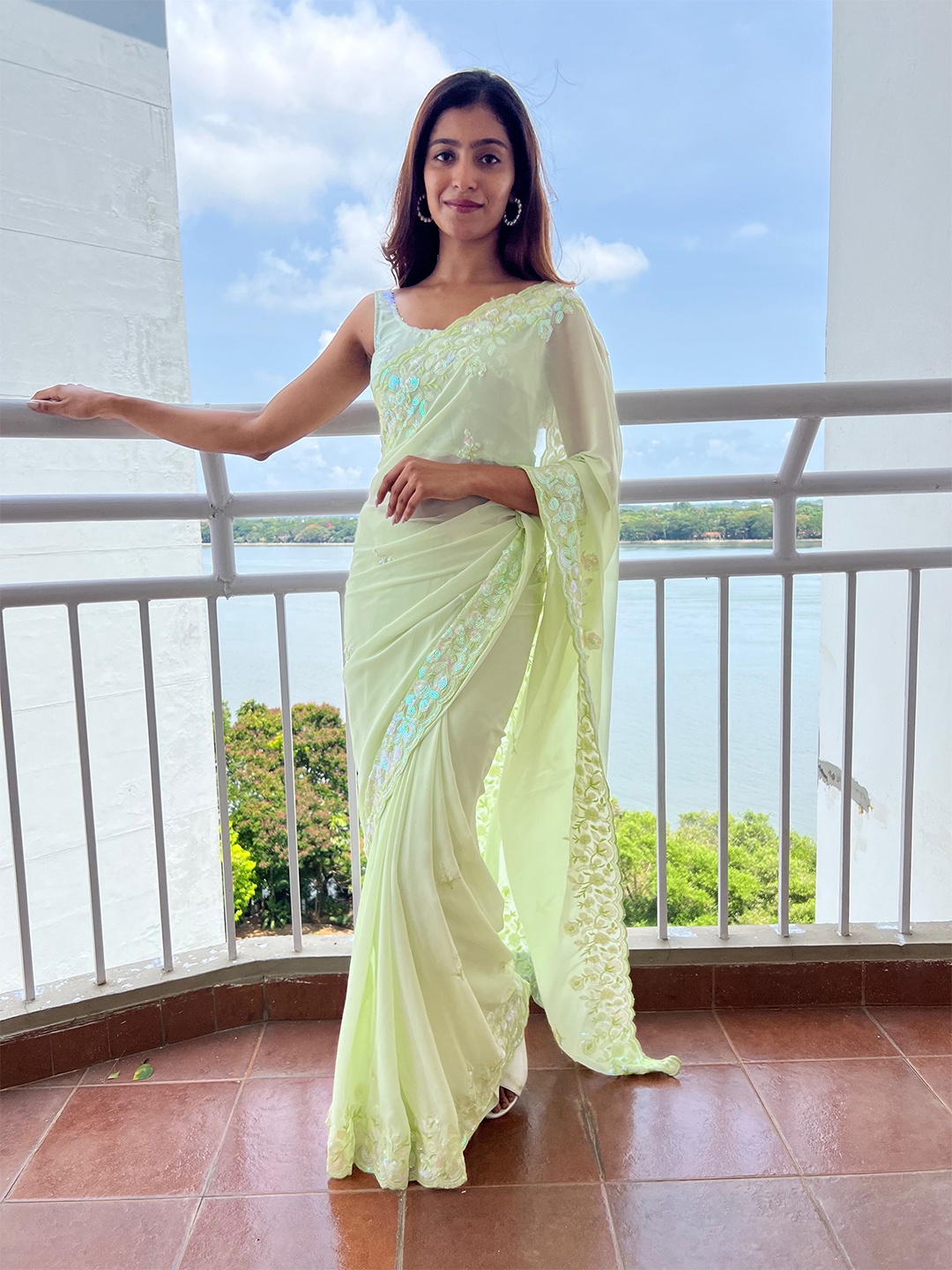 

Mitera Green Embellished Sequinned Saree