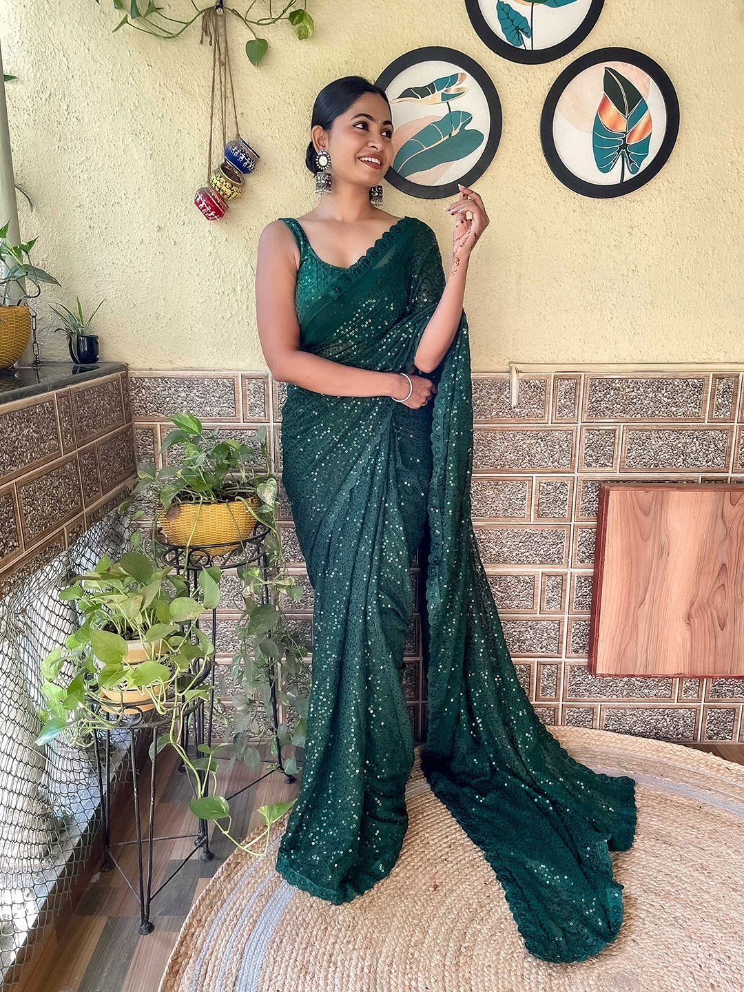 

Mitera Green Embellished Sequinned Saree