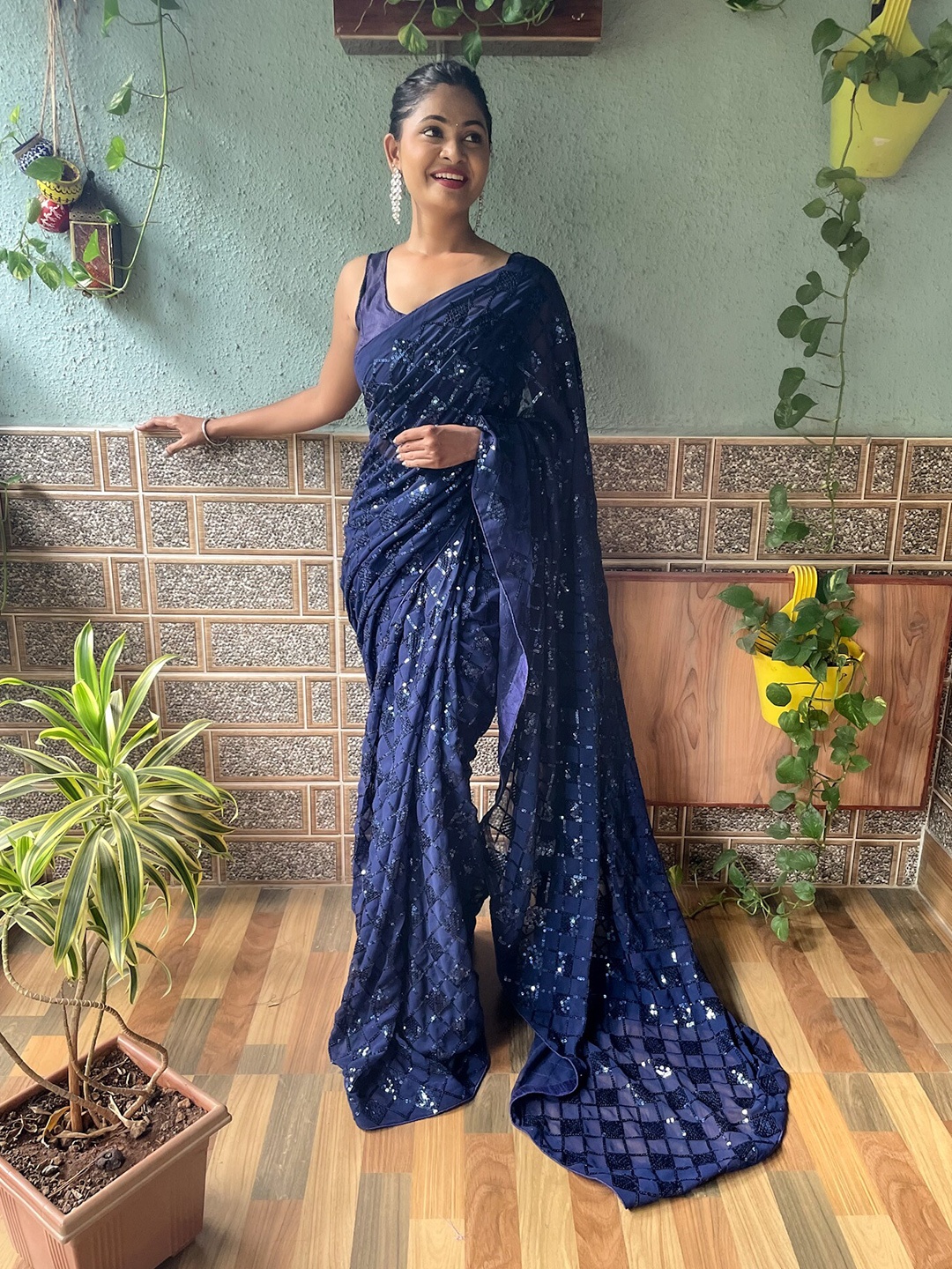 

Mitera Navy Blue Embellished Sequinned Saree