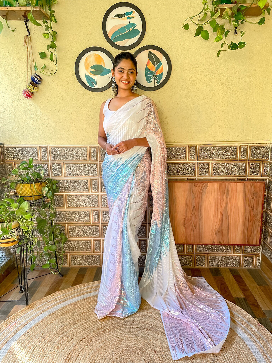 

Mitera White Embellished Sequinned Saree