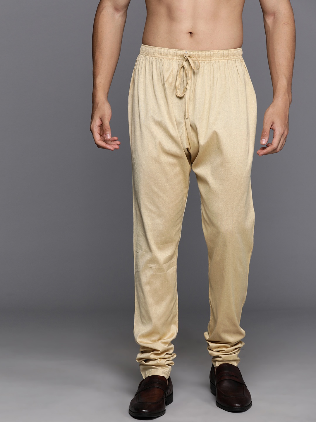 

Manu Men Solid Ankle-Length Churidar, Beige