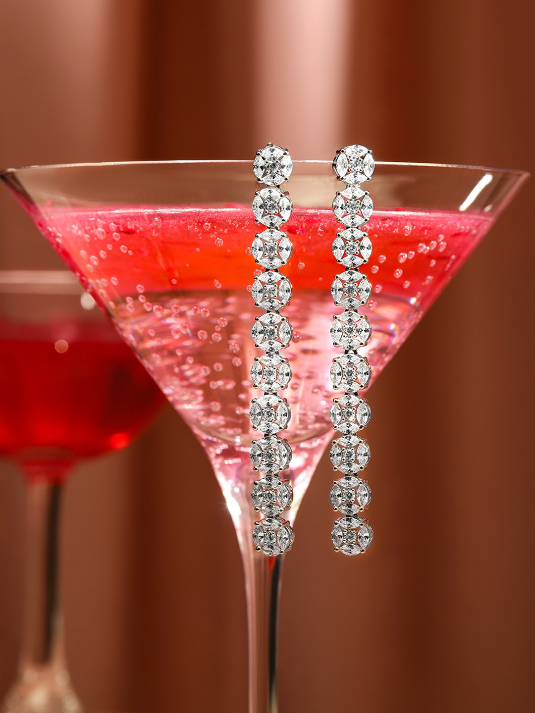 

Rubans Rhodium Plated in Silver Toned Zirconia Studded Contemporary Long Drop Earrings