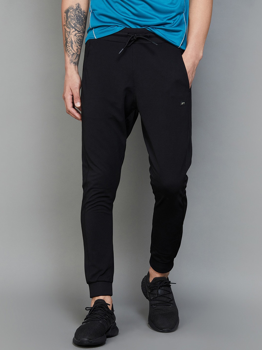 

Fame Forever by Lifestyle Men Mid Rise Ribbed Sports Joggers, Black