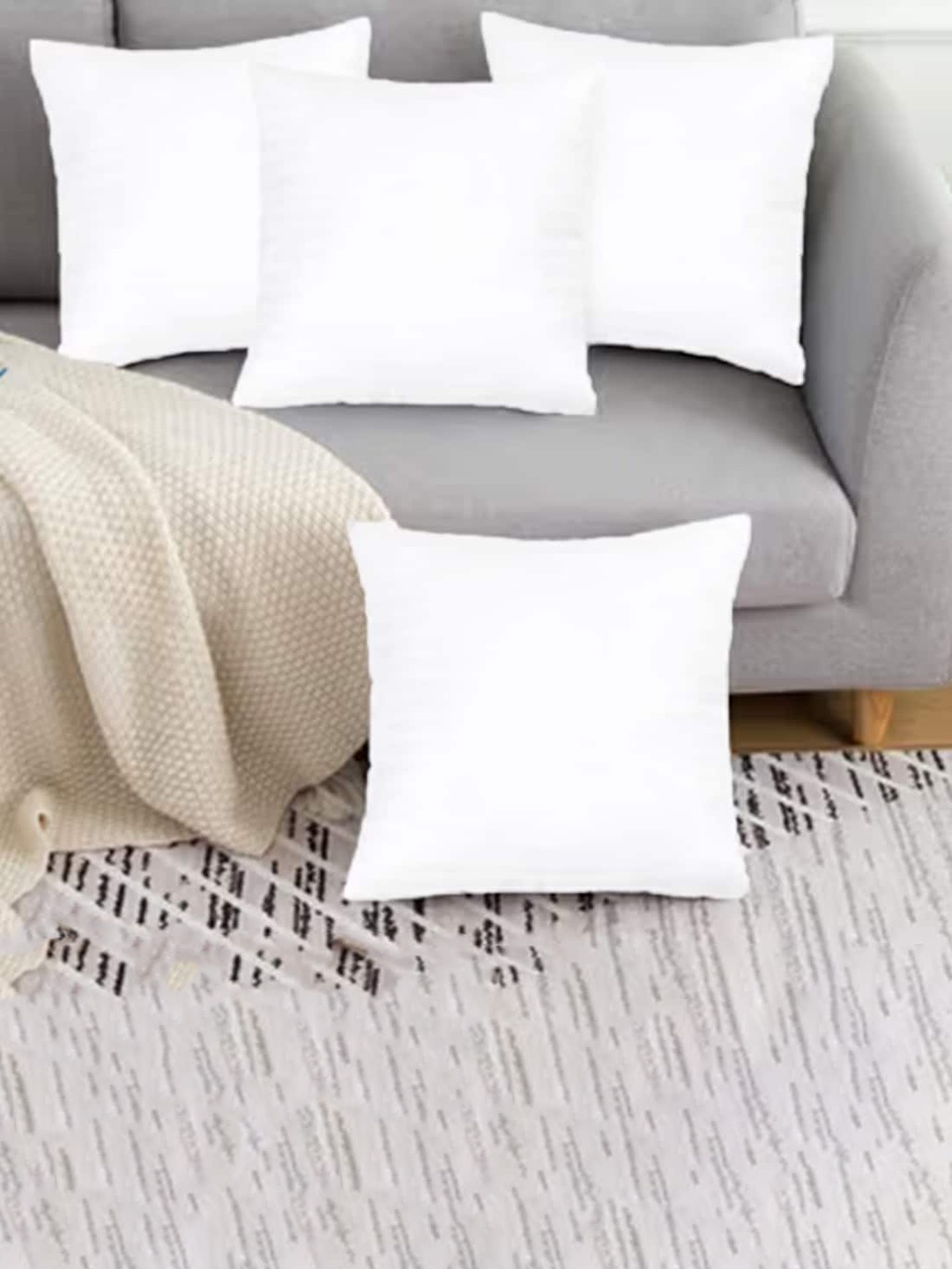 

Adbeni White 4 Pieces Skin Friendly Pre-Filled Cushions