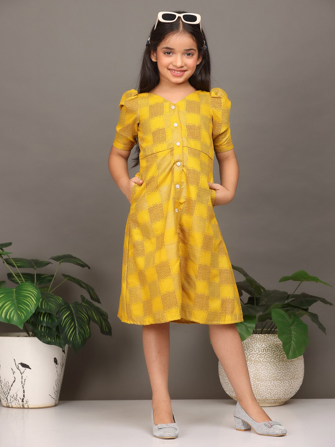 

Ethnovog Girls Abstract Printed V-Neck Puff Sleeves A-Line Midi Dress, Mustard