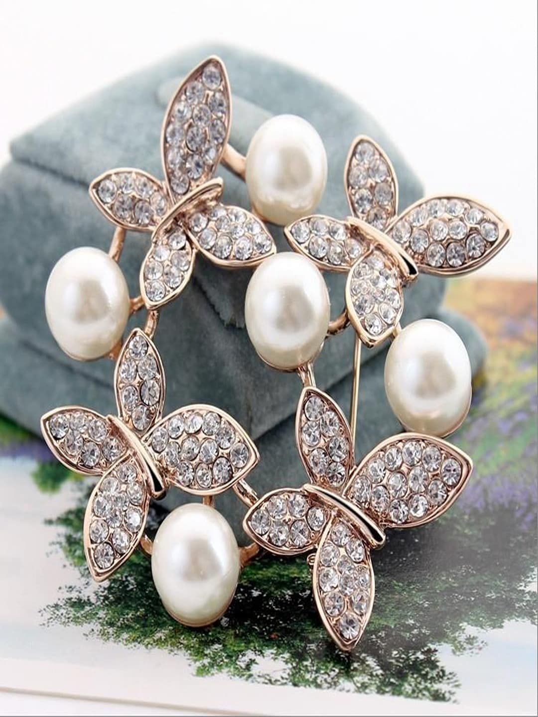 

UNIVERSITY TRENDZ Gold-Plated Crown Circle-Designed Pearl & Crystal Studded Brooch, White