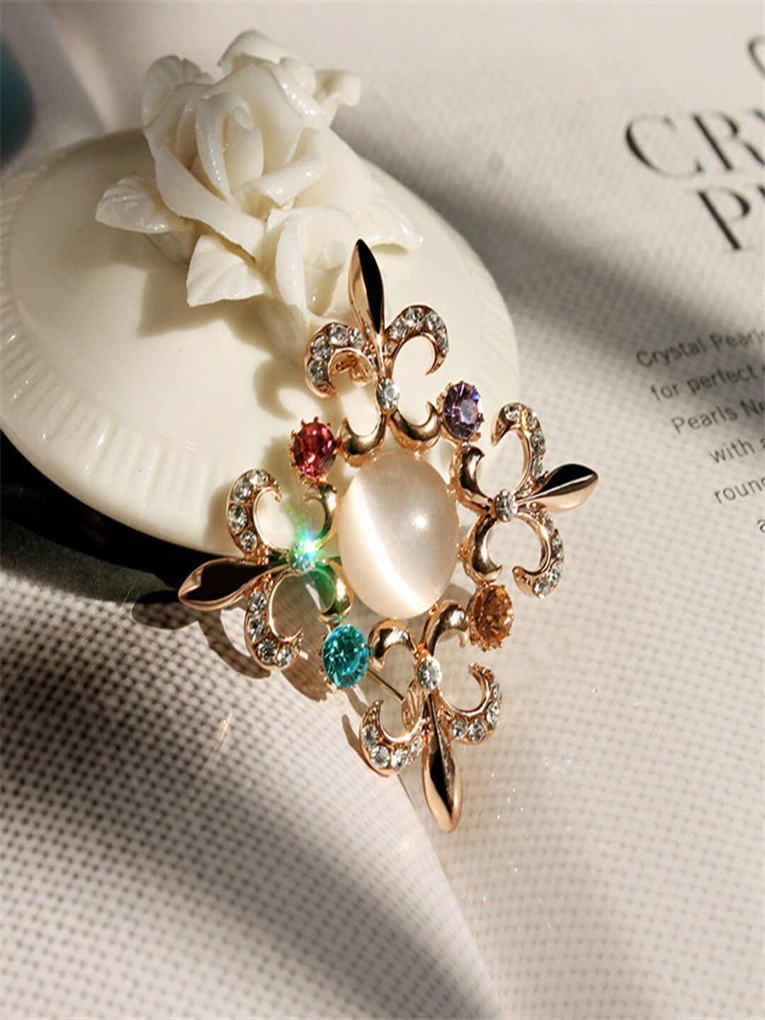 

UNIVERSITY TRENDZ Women Crystal & Pearl Studded Floral Brooch, Gold