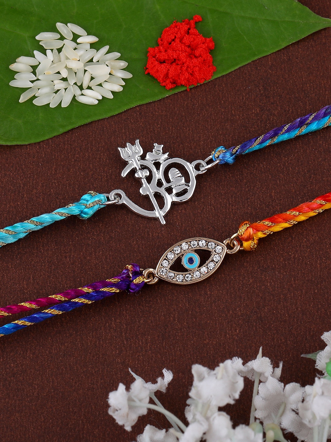 

Estele Set Of 2 Evil Eye & Om Charm Thread Rakhi, Gold