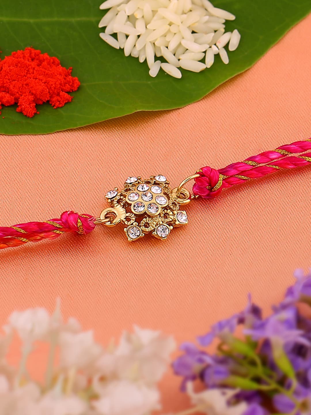 

Estele Unisex Gold-Plated Crystal-Studded Rakhi