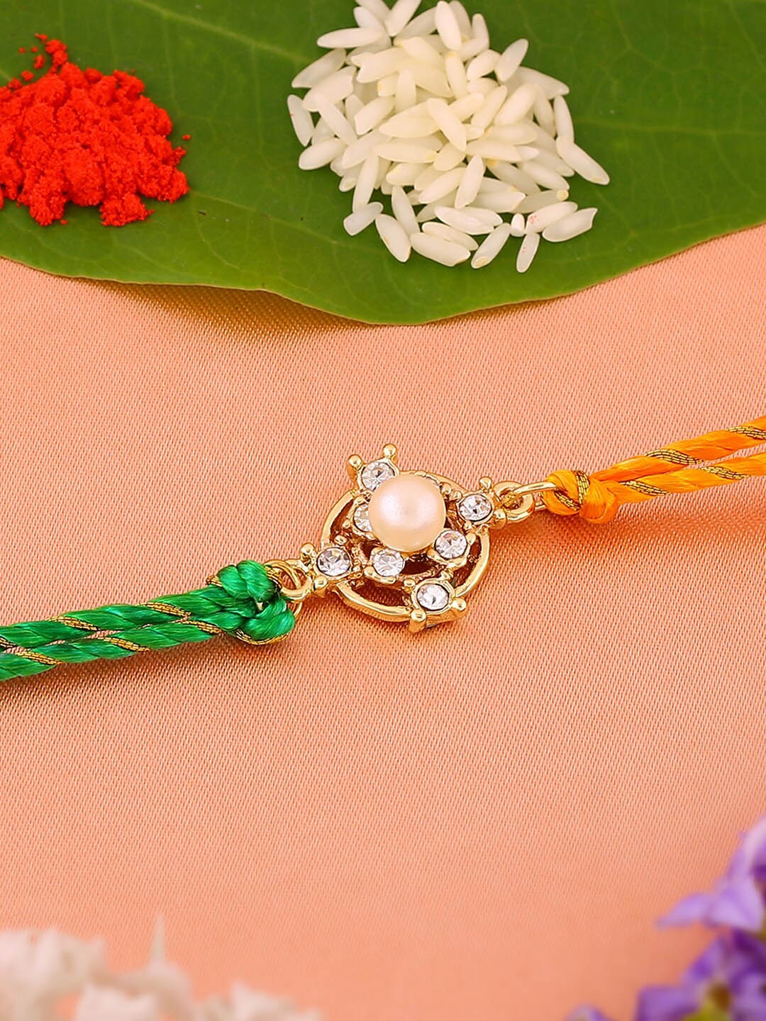 

Estele Unisex Gold-plated Artificial Stones-Studded Rakhi